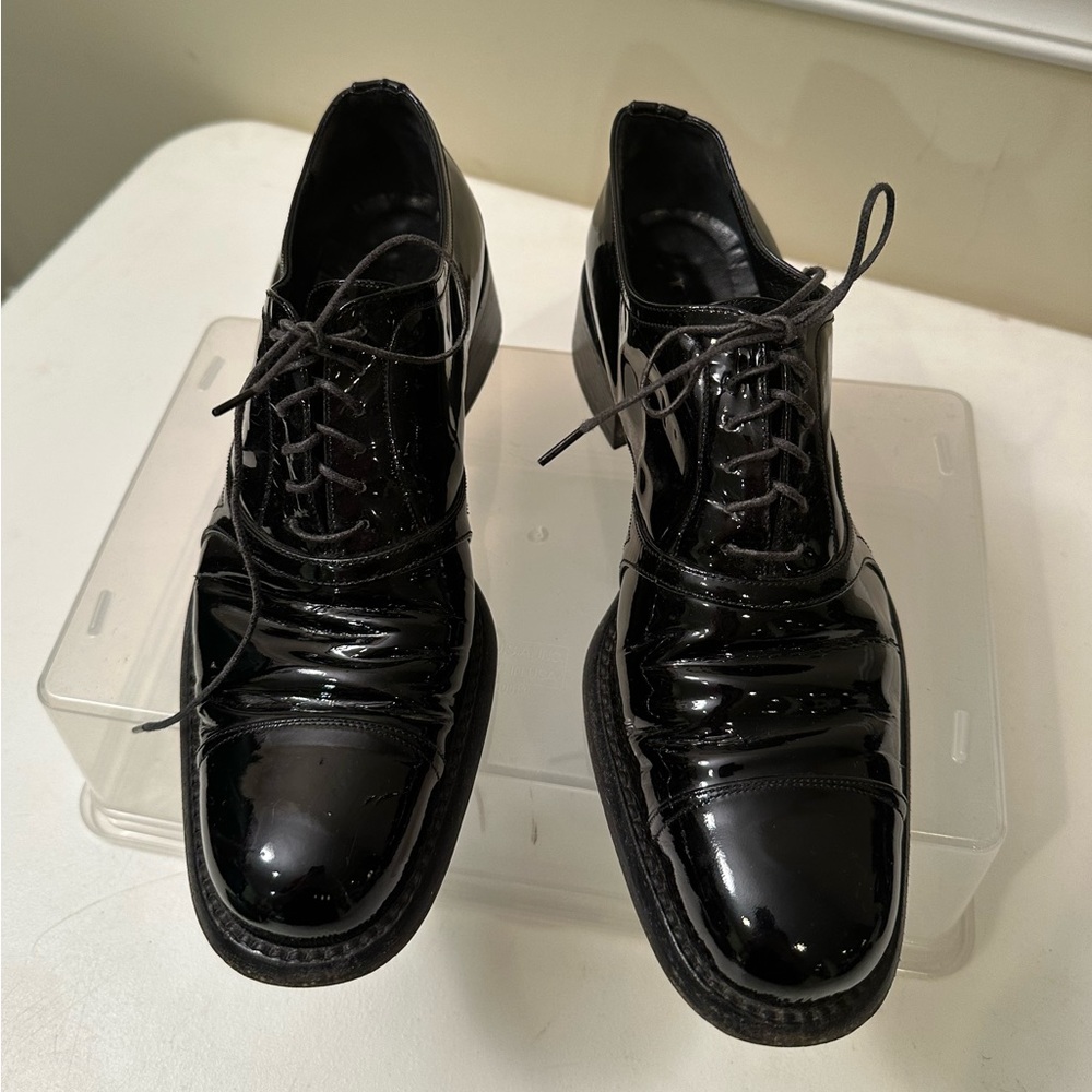 PRADA vintage black patent leather tie shoes. Still in good condition.